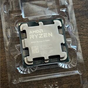 AMD Ryzen 5 7600 CPU - Silver and Black